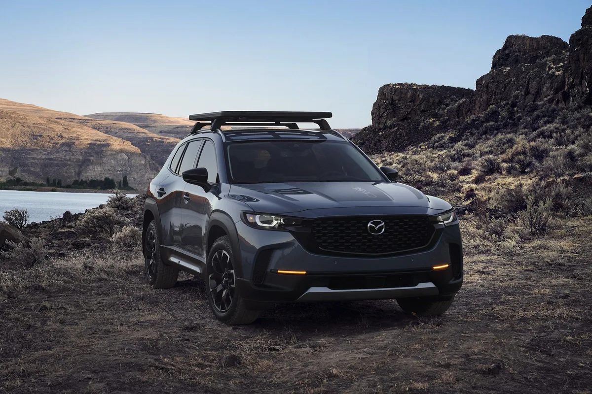 Mazda CX-50 in Polymetal Gray with roof rack, front three-quarter view