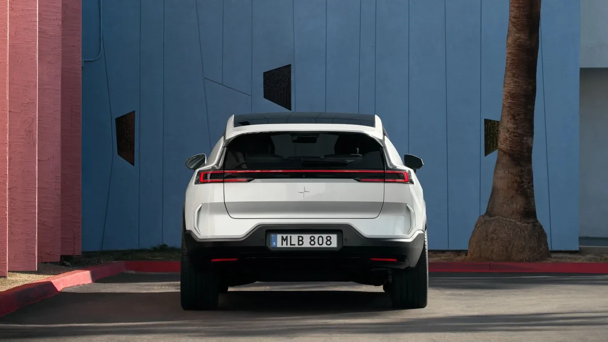 Polestar 3 in white, rear view with full-width light bar