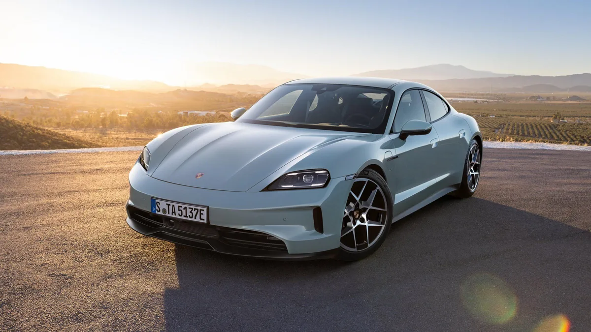 Porsche Taycan front view at sunset