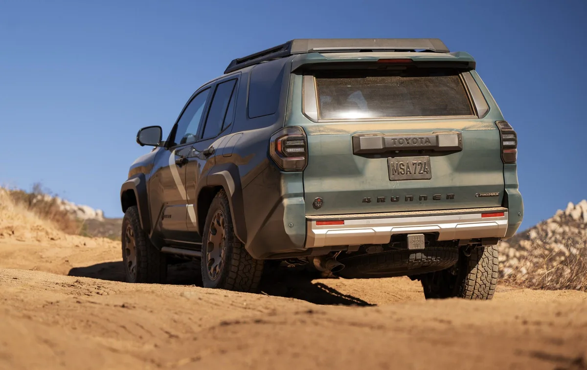 Toyota 4Runner in green on a desert trail, rear view